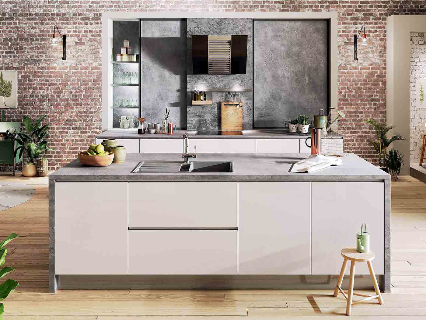 Beton ist das angesagte Highlight in der Küche. Kombiniert mit hellen Fronten wirkt die Küche besonders einladend. 